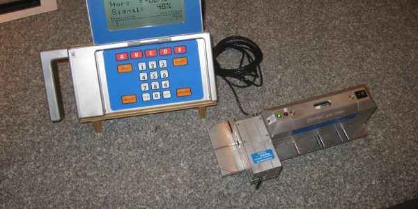 Surface Plate Checking Auto Collimator Laser auto-collimator for surface plate checking and antenna alignment.