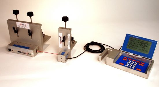 Custom laser transmitter and receiver mounting for steel plate alignment and checking system.